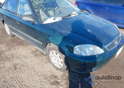 1999 Honda Civic Lx from USA, damaged, VIN 2HGEJ6679XH558866